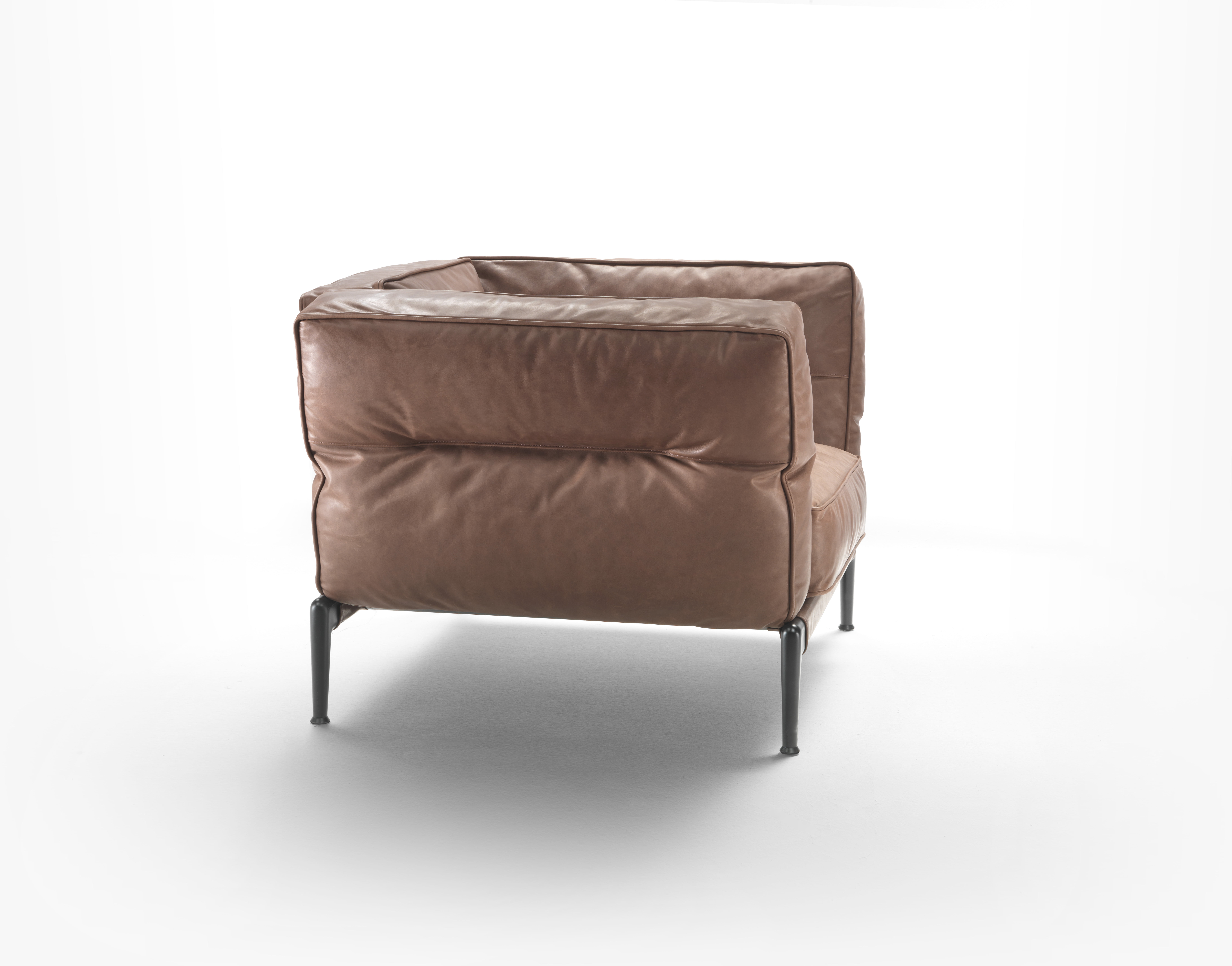 Flexform Adda fauteuil in leder zijkant