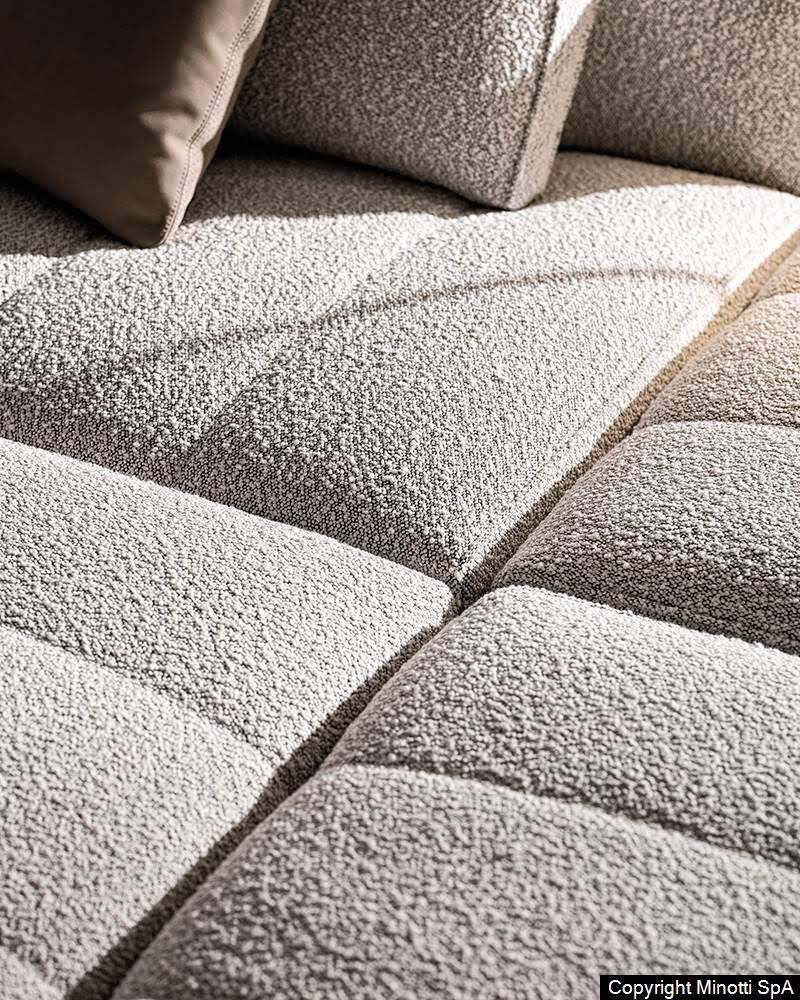 Minotti Goodman bank detail stoffering en stiksels creme