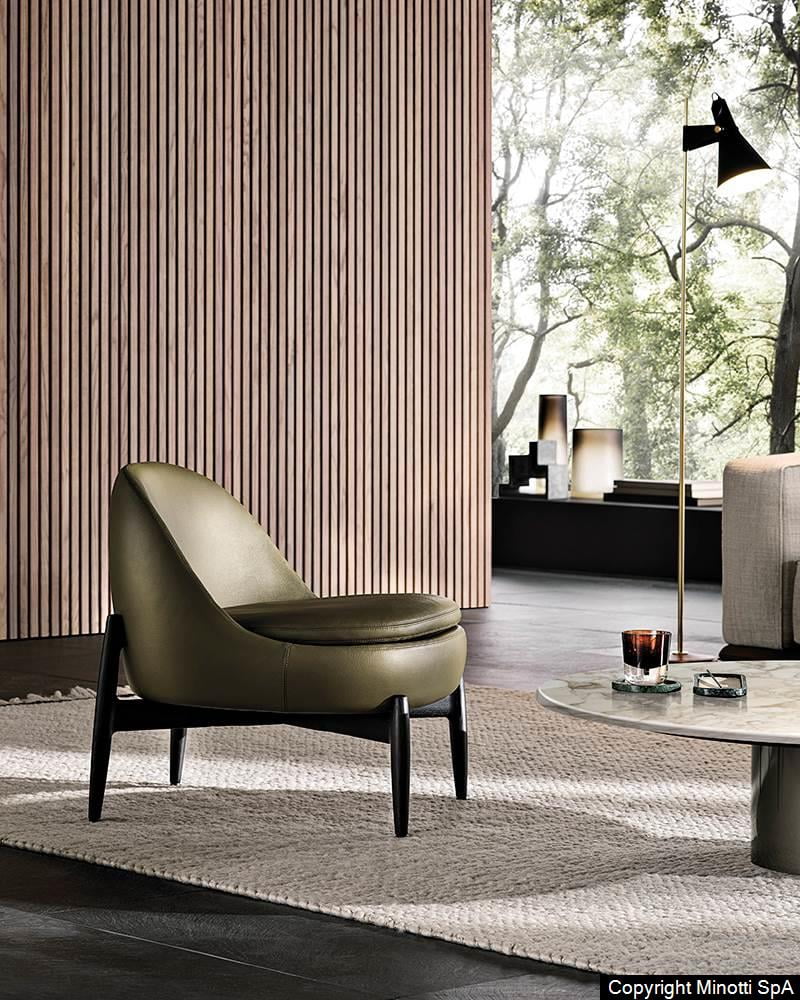 Design meubelen: Minotti Sendai fauteuil in groen lederen uitvoering op zwart essenhout onderstel