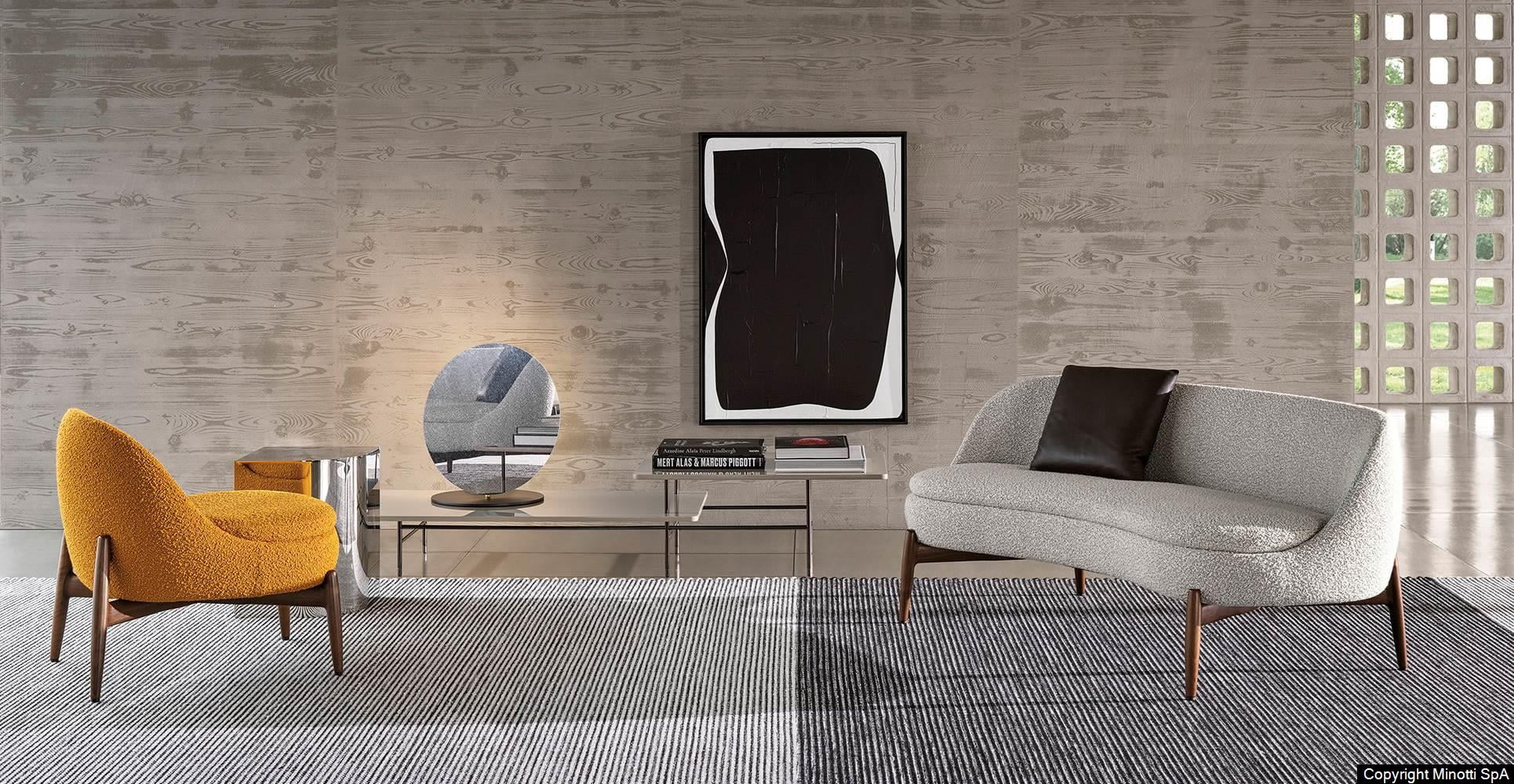Minotti Sendai fauteuil in oranje bouclestof in combinatie met Sendai bankje
