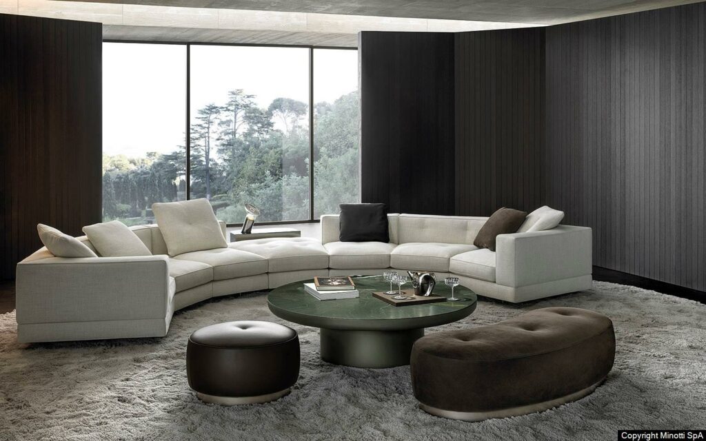 Minotti Dylan low design Rodolfo Dordoni vooraanzicht bank ronde zithoek lichte bekleding