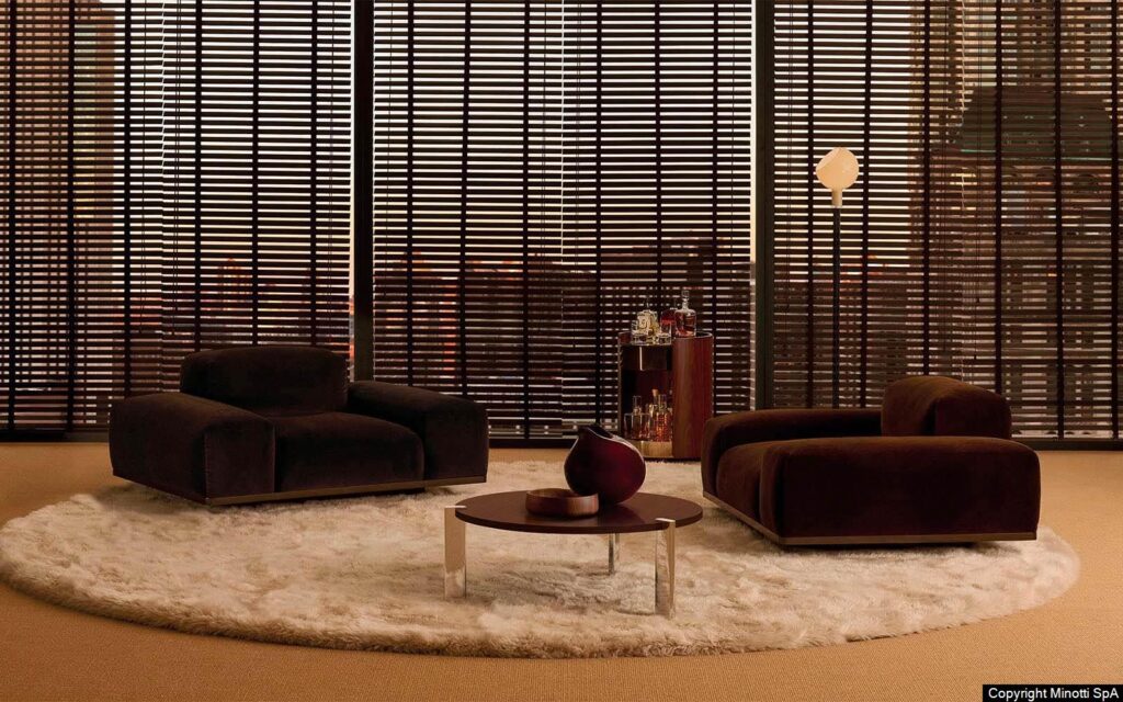 Minotti Orion fauteuils bruin leder interieur sfeerfoto